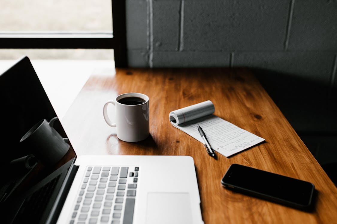 An Edinburgh business owner reviewing their cyber security posture using an IT security checklist